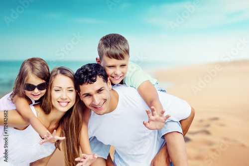 Happy young family with child travel at vacation.