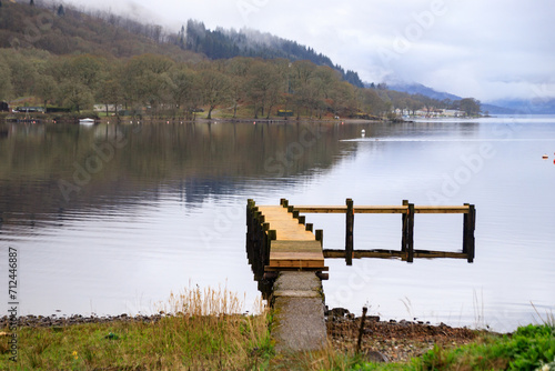 Tranquil Morning at the Lakeside Wooden Dock