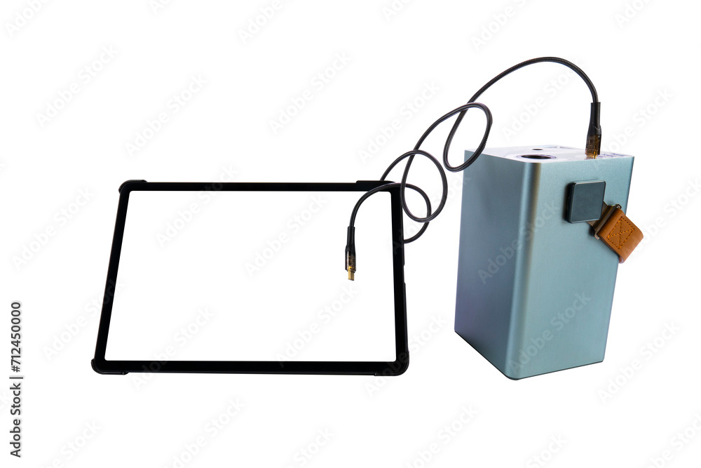 Tablet PC with a blank transparent screen next to a large power bank (charging station) with a USB cable on a transparent background. Mobile power supply Tablet PC with a blank transparent screen next to a large power bank (charging station) with a USB cable on a transparent background. Mobile power supply