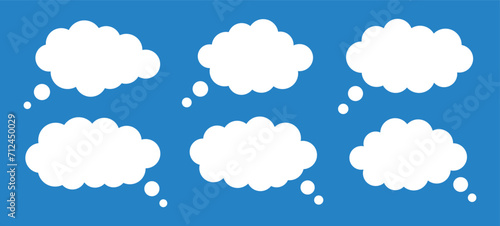 Set of clouds, vector speech bubble collection. Hand drawn white speech balloon, chat bubbles or dialog boxes isolated on blue background. Cute clouds for talk and dialogue. Vector illustration