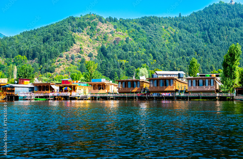 Dal Lake and the beautiful mountain range in the background, in the summer Boat Trip, of city Srinagar Kashmir India.