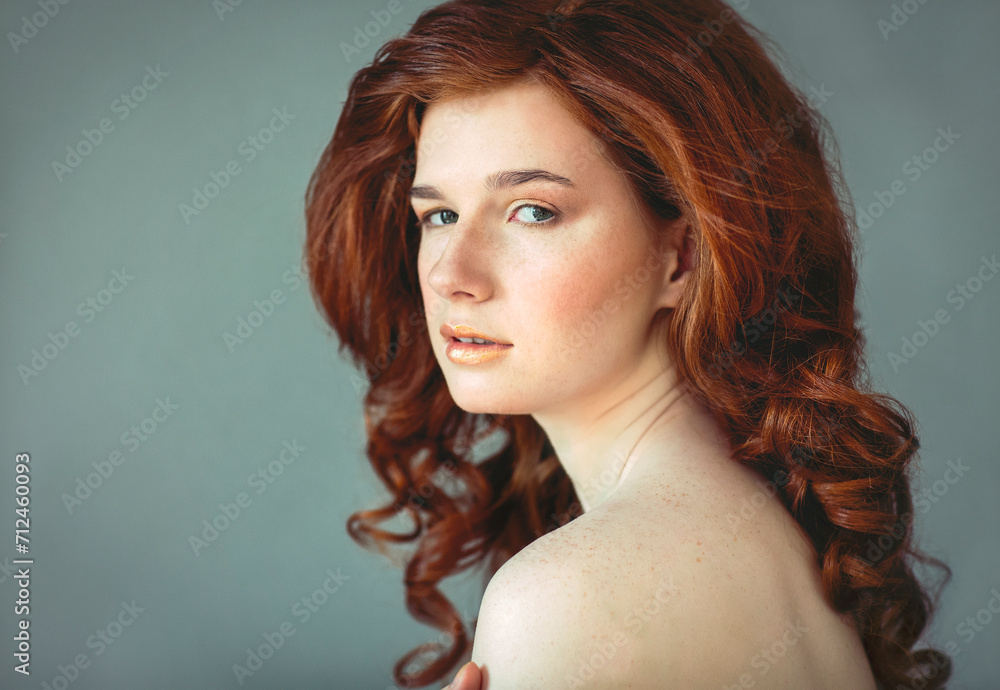 Beautiful young redhead woman with freckles portrait Beautiful young redhead woman with freckles portrait