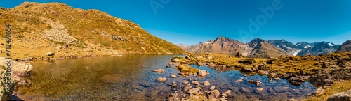 High resolution stitched alpine summer panorama with reflections in Lake Seeles at the famous Kaunertal Glacier Road, Landeck, Tyrol, Austria