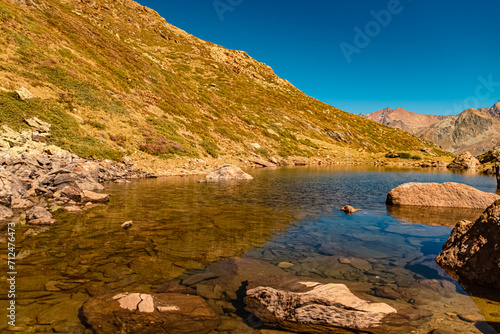 Alpine summer view with reflections in Lake Seeles at the famous Kaunertal Glacier Road, Landeck, Tyrol, Austria