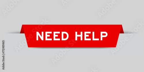 Red color inserted label with word need help on gray background
