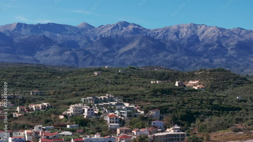 Mountain Aerial view of Crete island, Greece. Mountain landscape, olive groves and vineyards at sunset. Aerial video flying over the southern Aegean Sea with a view of Oia, Santorini, Greece, sunrise Mountain Aerial view of Crete island, Greece. Mountain landscape, olive groves and vineyards at sunset. Aerial video flying over the southern Aegean Sea with a view of Oia, Santorini, Greece, sunrise