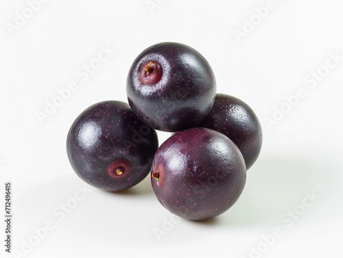 Fresh acai berries isolated on white background in a minimalist style.
