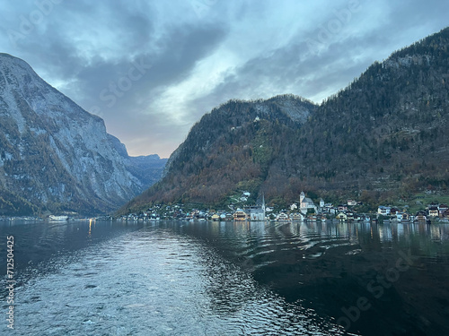 The city of Hallstatt, with its mountains, viewed from the ferry boat across Lake Hallstatt, Austria.