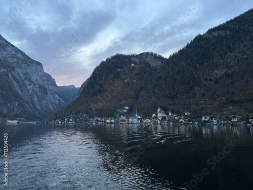 The city of Hallstatt, with its mountains, viewed from the ferry boat across Lake Hallstatt, Austria.