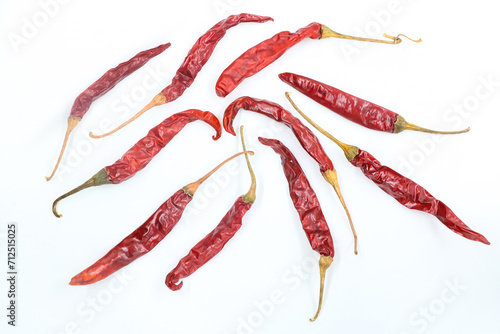 Dried red chili peppers, spices,peper, paprika on white background.