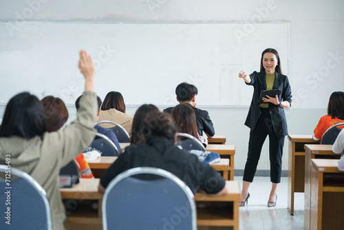Education  teaching  learning concept. Asian university lecturer teaching lesson to students in classroom