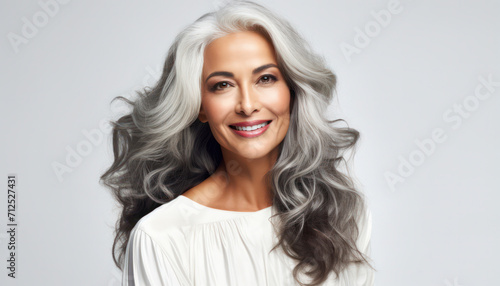Elegant Senior Lady: Portrait of a Happy, Confident, and Stylish Mature Woman with Grey Hair - Banner of Ageless Beauty, Modern Lifestyle, and Positive Contentment in a Studio Setting