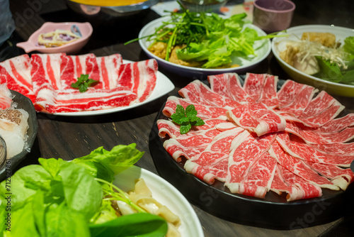 Slice of beef and vegetable for hotpot at restaurant