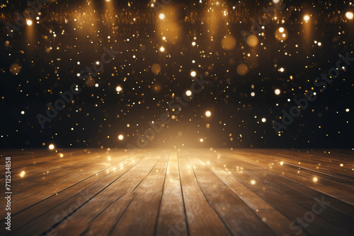 Twinkling gold glitter falling on the stage illuminated with one spot light  © Ahmed