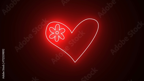 Red heart shape isolated on black