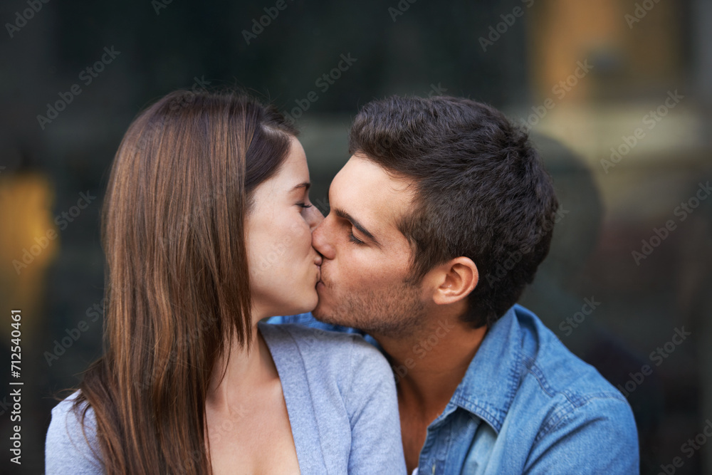 Love, kiss and a young couple outdoor for care, commitment and people in connection. Romance, man and woman touch lips together for bonding, trust in relationship and affection on valentines day date Love, kiss and a young couple outdoor for care, commitment and people in connection. Romance, man and woman touch lips together for bonding, trust in relationship and affection on valentines day date