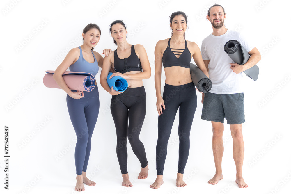 Group of happy sporty women and guy wearing body stylish sportswear holding personal carpets leaned on a white background. waiting for yoga class or body weight class. healthy lifestyle and wellness Group of happy sporty women and guy wearing body stylish sportswear holding personal carpets leaned on a white background. waiting for yoga class or body weight class. healthy lifestyle and wellness