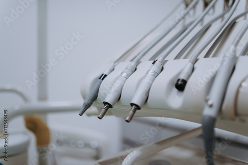 Close-up capture of meticulously arranged dental instruments, showcasing the precision and professionalism essential for thorough dental procedures and precise tooth treatments