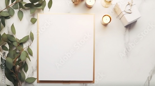 Top view composition of elegant candles, gold pen, and binder clips on a luxurious white marble background with a vase filled with fresh eucalyptus, creating a stylish and serene atmosphere