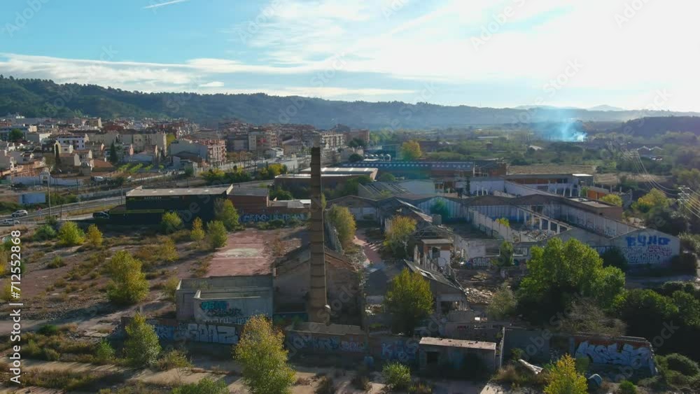 Abandoned industrial area with a big old chimney, Olesa de Montserrat Abandoned industrial area with a big old chimney, Olesa de Montserrat