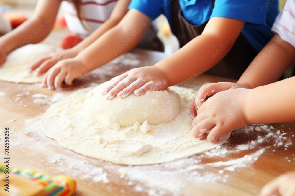 Three children kneading cookie dough on kitchen counter Three children kneading cookie dough on kitchen counter