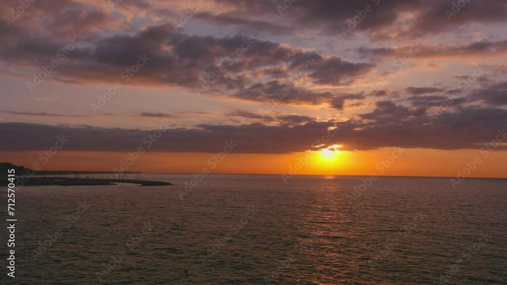 Dawn on Garraf horizon, with Ginesta port in background, Catalonia Dawn on Garraf horizon, with Ginesta port in background, Catalonia