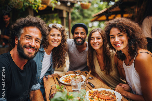 Generative AI image of cheerful multiethnic friends sharing a meal at an outdoor gathering photo