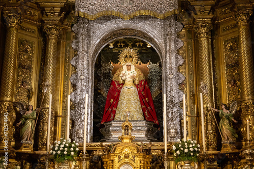Seville, Andalusia, Spain - January 2 2024: statue of the Virgin of Hope of the Macarena (Virgen de la Esperanza Macarena). Cathedral of the Macarena. Seville