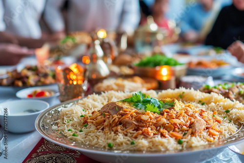 Closeup of al-fitr meals, on background arabian people at home