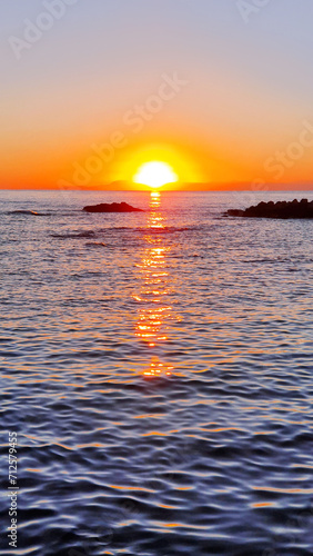 Colorful sunset over the sea waves.Sunset sky over sea.
