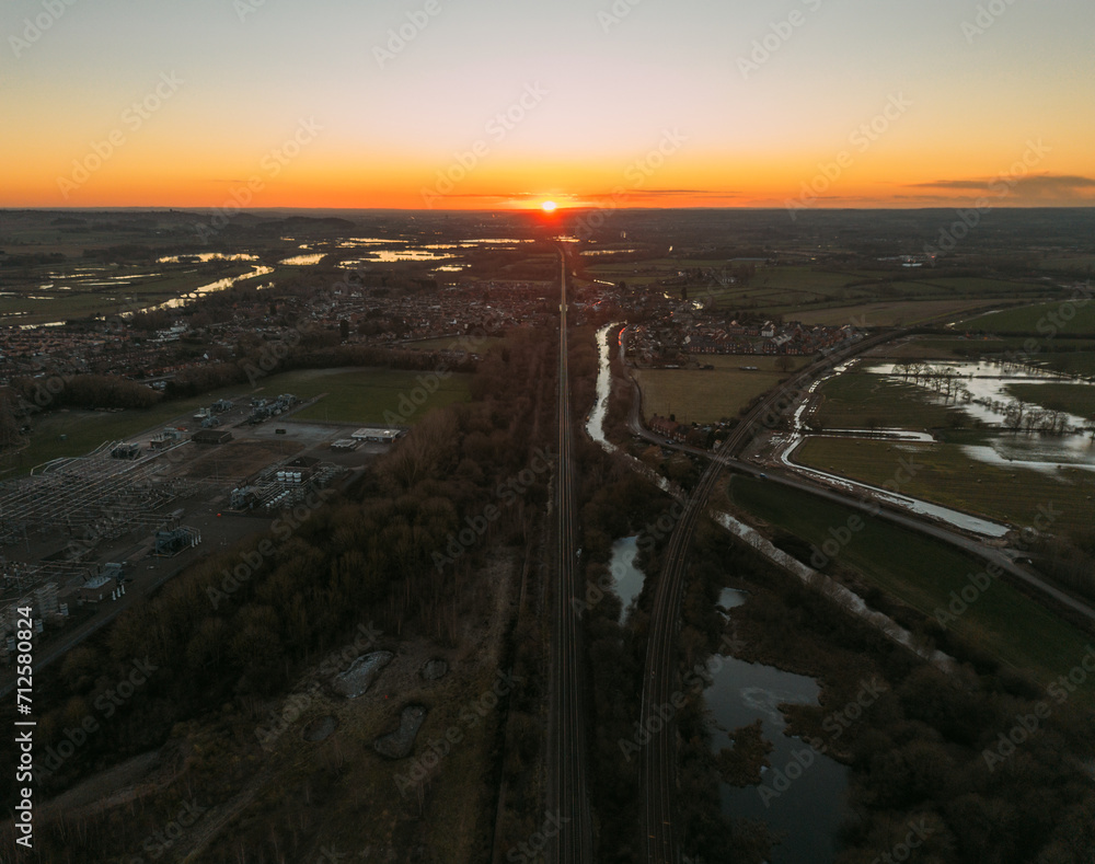 Aerial view of a railway at sunset