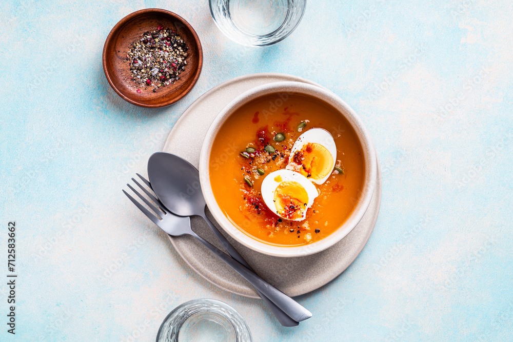 Butternut squash soup with boiled egg, autumn or winter delicious healthy food Butternut squash soup with boiled egg, autumn or winter delicious healthy food