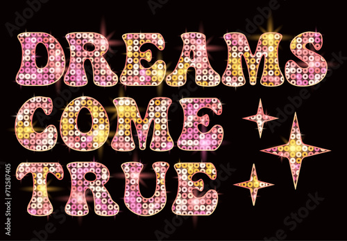 Shining text dreams come true. Letters and stars decorated with round yellow, peach, pink sequins