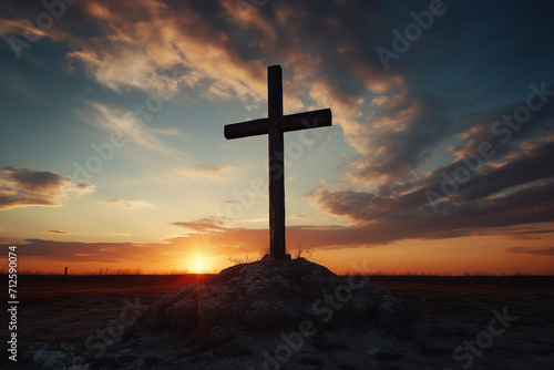Serene sunset sky gracefully frames a cross, creating a powerful and contemplative scene. Ideal stock photo for religious, inspirational, and tranquil themes
