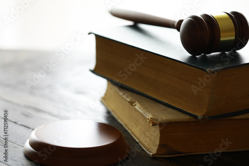Judges gavel on wooden desk. Law firm concept.