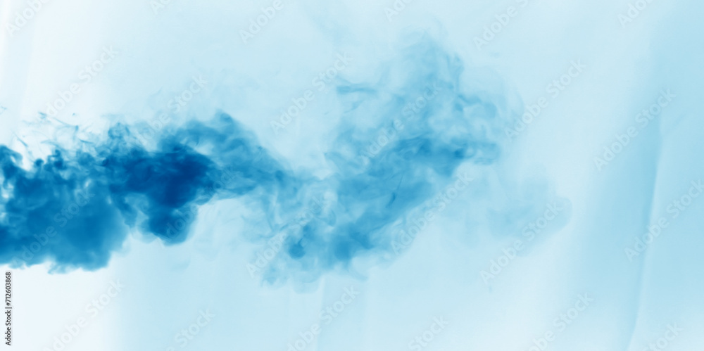 Light blur background with cyan, blue fog floating in the air.