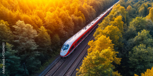 The high-speed train is driving at full speed thru the forest. AI-generated image 