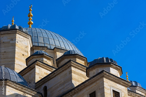 Architectural details of Eminonu New Mosque or Yeni Cami in Istanbul photo