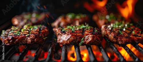 Meat grilling on a BBQ photo