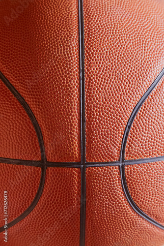 Basketball ball close-up in the frame. Sports background, basketball background, basketball theme © Александр Ланевский
