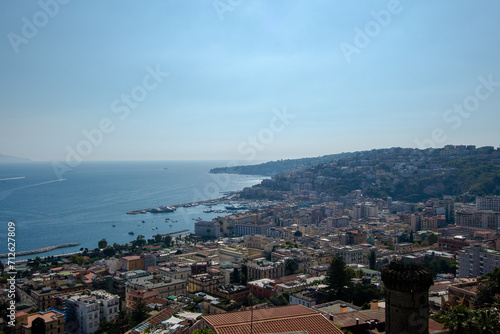 The famous city of Naples in the italian south with Largo Maradona, Plebiscito Square, the gallery, Quartieri Spagnoli Spaccanapoli Vomero and the lagoon. Murales all over the town photo