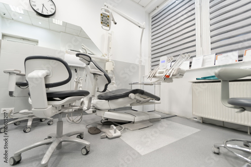Specialized medical dental equipment for the treatment of patients in a private dental office. A dental chair in the dentist s office of a dental clinic.