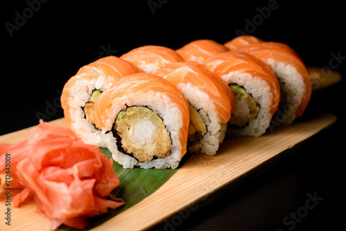 Close-up side view of a portion of philadelphia salmon sushi rolls