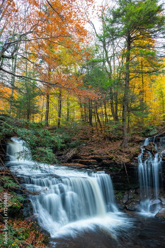 Fototapeta Naklejka Na Ścianę i Meble -  Cascade of waterfalls in a mountain gorge, fast flowing water, long exposure