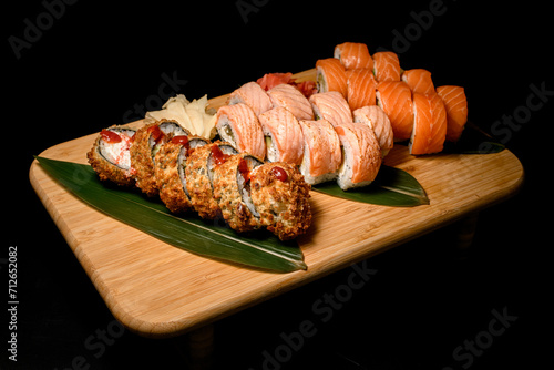 Set of sushi rolls: philadelphia with salmon, tuna and fried roll in batter