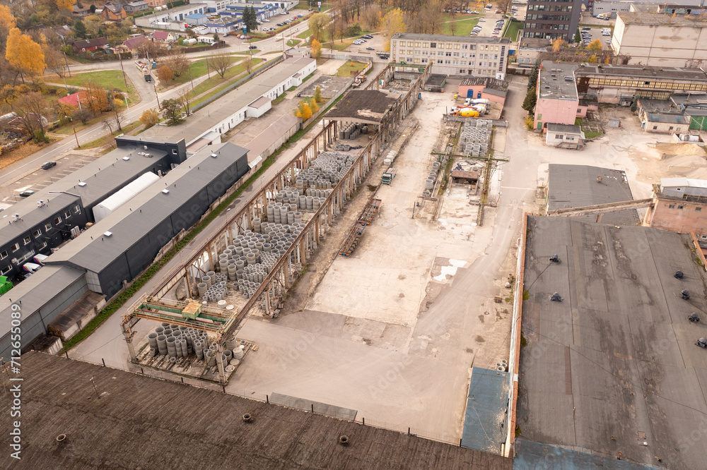Drone photography of old industrial park now used as storage during autumn day