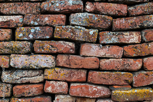 Close-up of old red brick wall texture background.