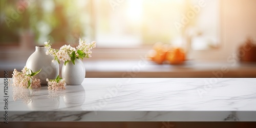 Marble countertop with blurred kitchen background. Product display table with bokeh backdrop. photo