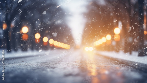A snowy street with parked cars, snow blowing outside, Snow storm in the city. a winter snow covered road in a city, concept of traffic safety on a slippery road © MD Media