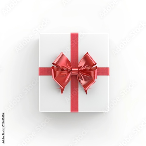 A white box with a red ribbon and a bow. © tilialucida